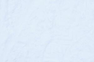 Snow boots track surface. Ski boot texture. Shoe sole traces background. photo