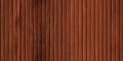 Red rustic ribbed metallic surface. Wavy iron wall pattern. Fluted metal fencing backdrop. Corrugated metal texture. Crimp fence background. photo