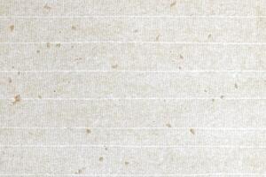 Gold spots decorated paper with stripes background. Decorative cream striped paper texture. Landscape horizontal orientation. photo
