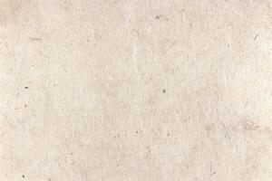 Hand-made decorative paper texture. Plant fibers handmade decorated paper background. Landscape horizontal orientation. photo