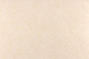Decorative cream kraft paper texture. Decorated handmade craft paper background. Landscape horizontal orientation. photo