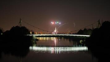 The colorful and beautiful fireworks show with the dark sky as background at night photo