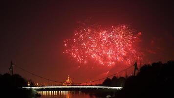 The colorful and beautiful fireworks show with the dark sky as background at night photo