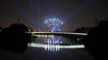 The colorful and beautiful fireworks show with the dark sky as background at night photo