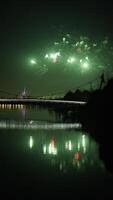 The colorful and beautiful fireworks show with the dark sky as background at night photo