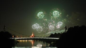 The colorful and beautiful fireworks show with the dark sky as background at night photo
