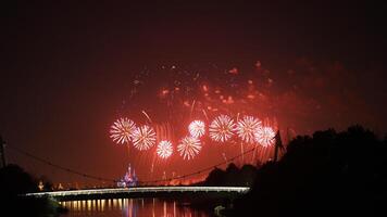 The colorful and beautiful fireworks show with the dark sky as background at night photo