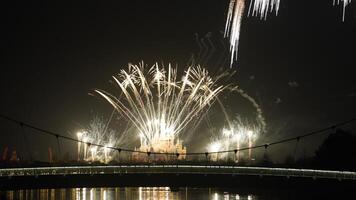 The colorful and beautiful fireworks show with the dark sky as background at night photo