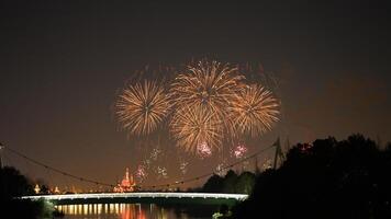 The colorful and beautiful fireworks show with the dark sky as background at night photo