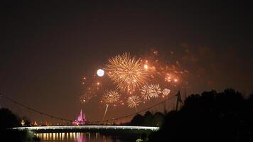The colorful and beautiful fireworks show with the dark sky as background at night photo