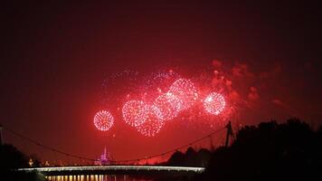 The colorful and beautiful fireworks show with the dark sky as background at night photo