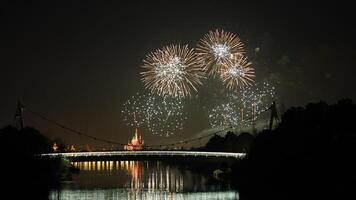 The colorful and beautiful fireworks show with the dark sky as background at night photo