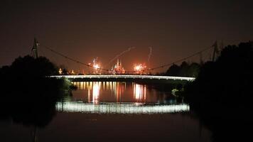 The colorful and beautiful fireworks show with the dark sky as background at night photo