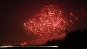 The colorful and beautiful fireworks show with the dark sky as background at night photo