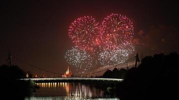 The colorful and beautiful fireworks show with the dark sky as background at night photo