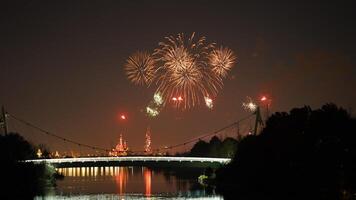 The colorful and beautiful fireworks show with the dark sky as background at night photo