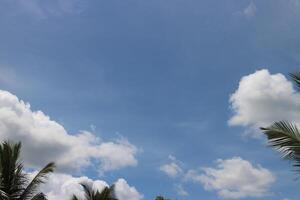 Blue sky background with clouds photo