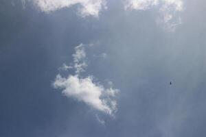 Blue sky background with clouds photo