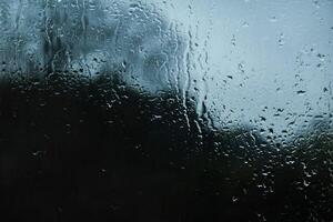 Window Rain, A serene blend of water and glass, Raindrops on Abstract Textured Glass photo