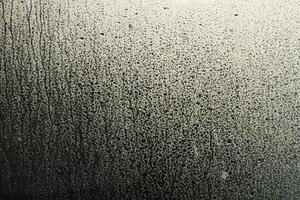Window Rain, A serene blend of water and glass, Raindrops on Abstract Textured Glass photo