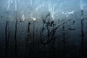Window Rain, A serene blend of water and glass, Raindrops on Abstract Textured Glass photo