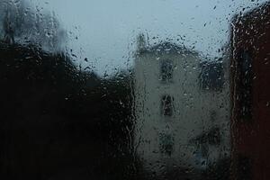 Window Rain, A serene blend of water and glass, Raindrops on Abstract Textured Glass photo