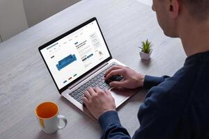 Purchase furniture online from ecommerce website. Illustrating the concept of searching for sofa couch with armrest conveniently through digital platform photo