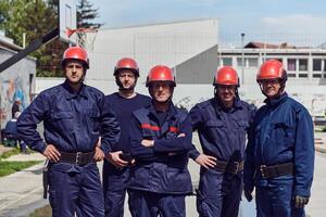 A team of confident and accomplished firefighters strides purposefully in their uniforms, exuding pride and satisfaction after successfully completing a challenging firefighting mission photo