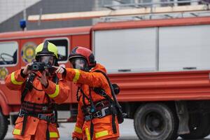 Firefighter Team Learning Thermal Camera Usage During Training Session photo