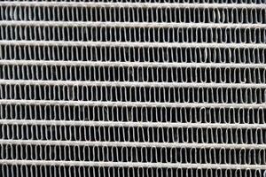 Texture of the old engine cooling radiator photo
