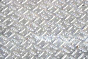 background of metal diamond plate in gray color photo