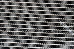 Texture of the old engine cooling radiator photo