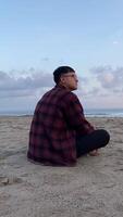 Sunset Solitude A Moment of Reflection by the Sea. Embrace the serene beach sunset, finding calm amidst life chaos in a journey of self-reflection. video