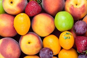 Beautiful Tropical Fruits Background A Luscious Display of Nature's Bounty, Featuring an Abundance of Colorful and Exotic Fruits Against a Vibrant and Refreshing Backdrop photo
