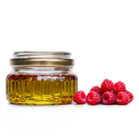 Red raspberry seed oil in a clear glass jar with a cluster of red raspberries png