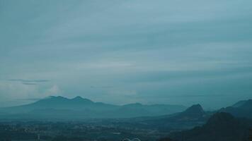Serene Mountain Landscape Under Cloudy Sky video