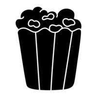 A flat design icon of popcorn bucket vector