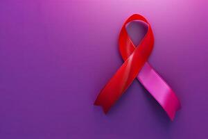 Red cancer awareness ribbon on purple backdrop. 3D rendering with copy space. photo