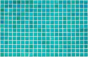 Texture of a wall covered with decorative brick-like tiles mosaic. Abstract background for design. photo