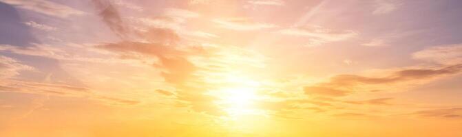 The rays of the sun breaking through the clouds in the evening or in the morning in the sunset or dawn sky. The concept of faith, hope for the best or good weather. photo