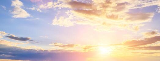 The rays of the sun breaking through the clouds in the evening or in the morning in the sunset or dawn sky. The concept of faith, hope for the best or good weather. photo