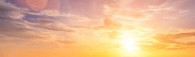 The rays of the sun breaking through the clouds in the evening or in the morning in the sunset or dawn sky. The concept of faith, hope for the best or good weather. photo