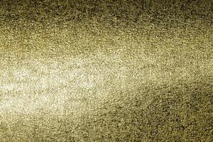Shiny gold metal texture. Golden abstract background. photo