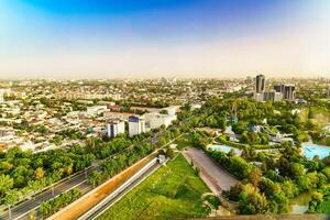 Uzbekistan, Tashkent - April 24, 2023 Top view from the observation deck on the Tashkent TV tower to the central part of the city during the daytime in spring. photo