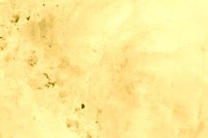 Texture of golden decorative plaster or concrete. Abstract gold grunge background. photo