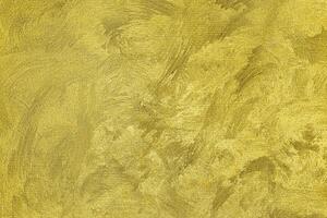 Texture of golden decorative plaster or concrete. Abstract gold grunge background. photo