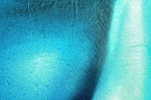 Colorful graffiti painted on a wall. Abstract urban background. Spray painting art. photo