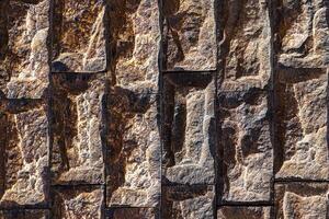 Texture of a decorative brick-like tiles. Abstract background for design. photo