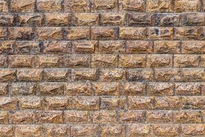 Texture of a decorative brick-like tiles. Abstract background for design. photo
