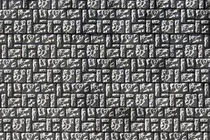 Texture of a decorative brick-like tiles. Abstract background for design. photo